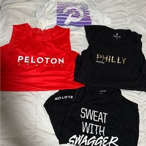Set of 4 medium Peloton tank tops! Hardly worn but fabric gets wrinkled easily